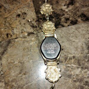 Woman's green quartz watch